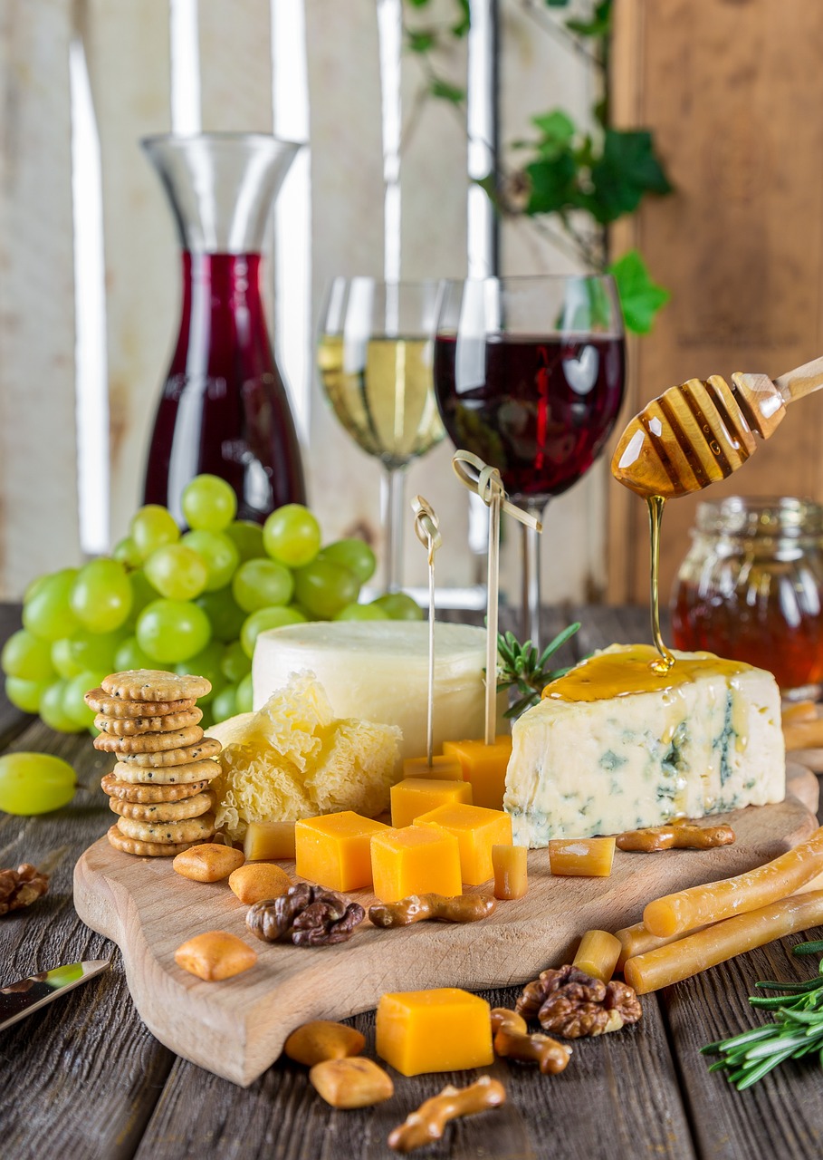assorted cheese board with wine